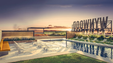 West facing rooftop pool deck, green space and unobstructed sunset views